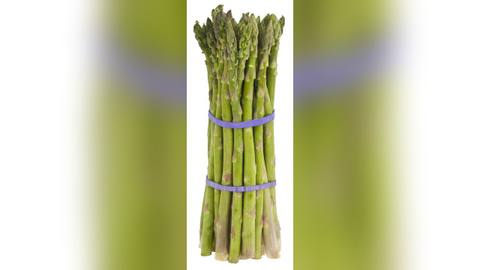 A bunch of fresh green asparagus tied with two rubber bands
