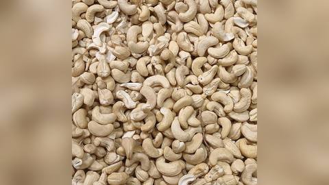 A heap of raw cashew nuts
