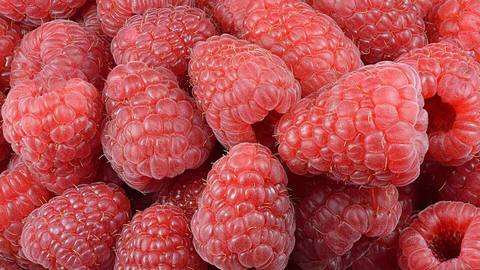 A close-up of fresh raspberries